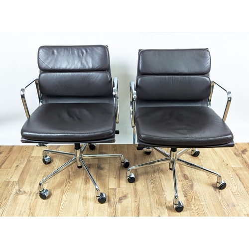 423 - AFTER CHARLES AND RAY EAMES SOFT PAD STYLE CHAIRS, a pair, 89cm high, 56cm wide, 53cm deep, (2)