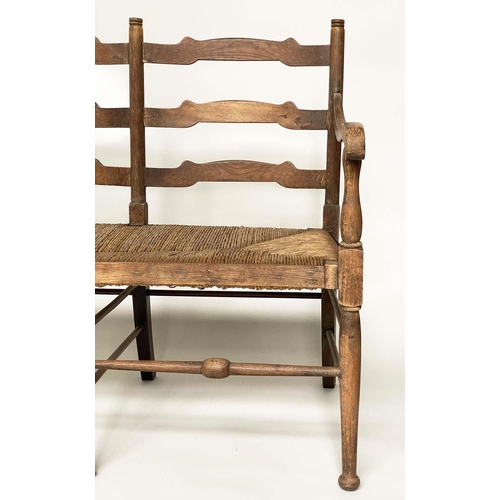 488 - HALL BENCH, early 20th century English oak with ladder back and rush seat, 157cm W.