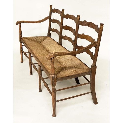 488 - HALL BENCH, early 20th century English oak with ladder back and rush seat, 157cm W.