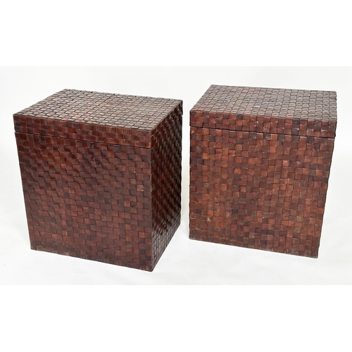 124 - TRUNK/LAMP TABLES, a pair, woven leather each hinged, 57cm x 57cm x 62cm H. (2)