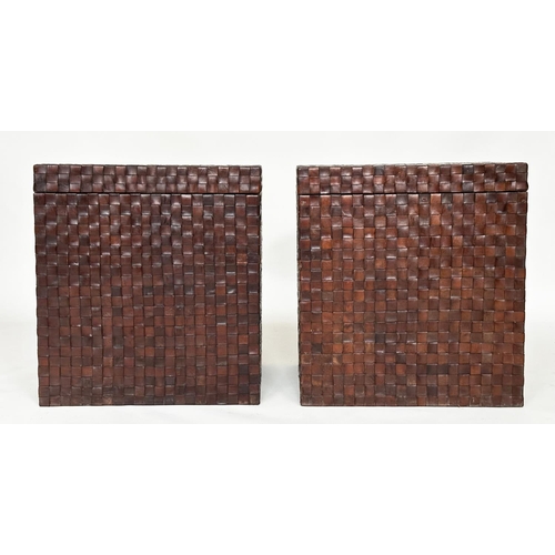 124 - TRUNK/LAMP TABLES, a pair, woven leather each hinged, 57cm x 57cm x 62cm H. (2)