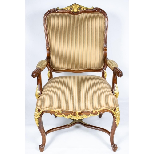 135 - OPEN ARMCHAIRS, a pair, each 68cm x 115cm H, with carved showframes and gilt detail. (2)