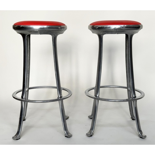 214 - BAR STOOLS, a pair, Joan Casa Ortinex Indescasa cast aluminum circular with red wipeable seats and f... 