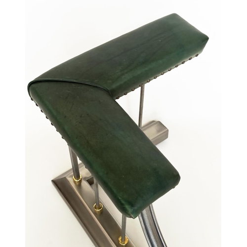 291 - CLUB FENDER, vintage steel with studded green leather seat pads raised upon shaped balustrade suppor... 