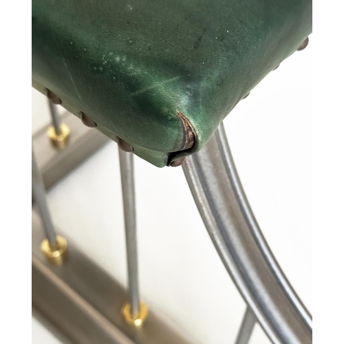 291 - CLUB FENDER, vintage steel with studded green leather seat pads raised upon shaped balustrade suppor... 