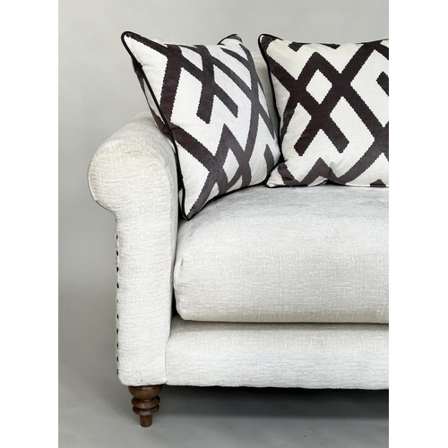 293 - SOFA, Harrison two seater in cream/off white cut velvet chenille with scroll arms, studded sides and... 