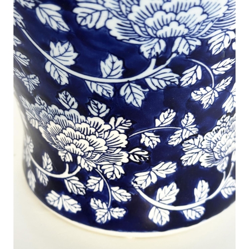 297 - TEMPLE JAR, Chinese white and indigo blue ceramic of lidded vase form, 53cm H.