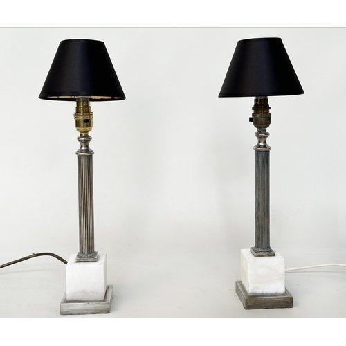 299 - COLUMN TABLE LAMPS, a pair, with silvered reeded columns and square marble plinths, with shades, 48c... 