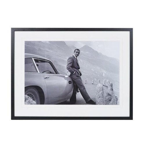 358 - SEAN CONNERY AS JAMES BOND WITH ASTON MARTIN, photographic print, framed, 63cm x 83cm.