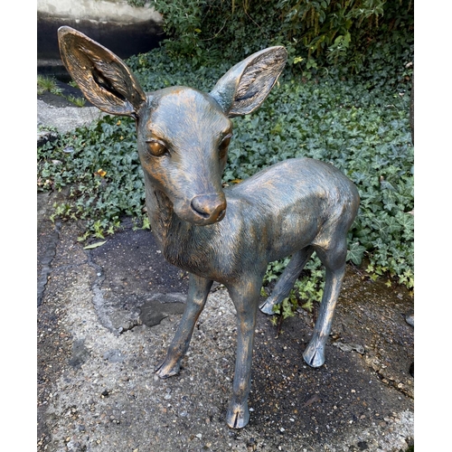 359 - CONTEMPORARY SCHOOL SCULPTURAL STUDIES, a set of two, depicting a Doe and Fawn, resin, in a bronzed ... 