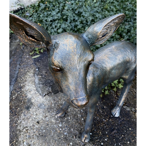 359 - CONTEMPORARY SCHOOL SCULPTURAL STUDIES, a set of two, depicting a Doe and Fawn, resin, in a bronzed ... 