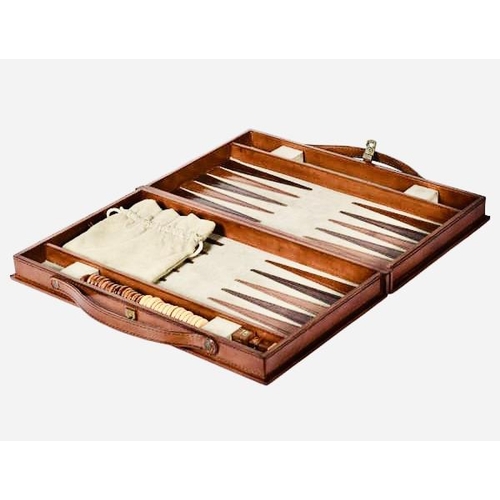 362 - BACKGAMMON SET, in leathered case, 7cm x 23cm x 40cm.