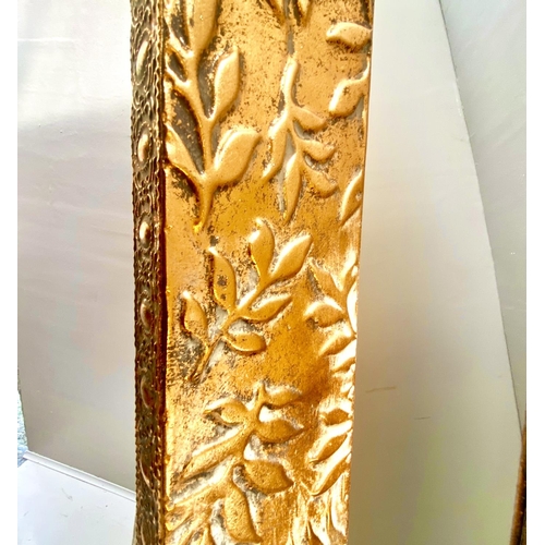 367 - DRESSING MIRROR, floor standing foliage embossed gilt metal frame, 156cm high, 57cm wide, 48cm deep.