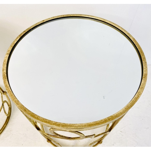 374 - SIDE TABLES, a pair, 56cm high, 46cm diameter, gilt metal lattice design frames, mirror glass tops. ... 