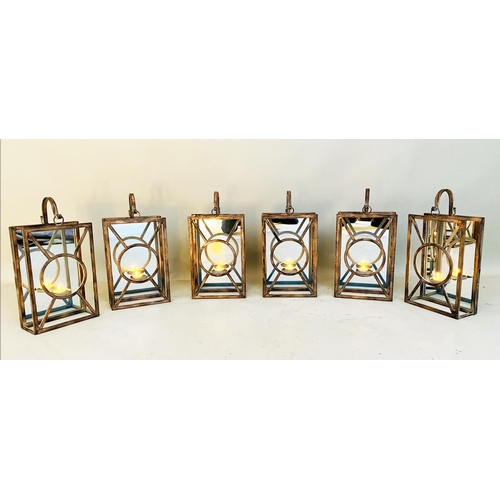 379 - WALL HANGING CANDLE LANTERNS, a set of six, Art Deco style, mirrored backs, 43cm x 22cm x 11cm. (6)