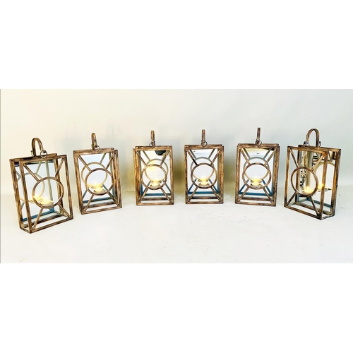 379 - WALL HANGING CANDLE LANTERNS, a set of six, Art Deco style, mirrored backs, 43cm x 22cm x 11cm. (6)