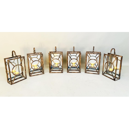 379 - WALL HANGING CANDLE LANTERNS, a set of six, Art Deco style, mirrored backs, 43cm x 22cm x 11cm. (6)