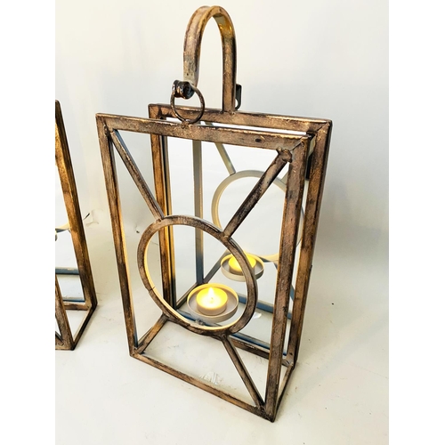 379 - WALL HANGING CANDLE LANTERNS, a set of six, Art Deco style, mirrored backs, 43cm x 22cm x 11cm. (6)