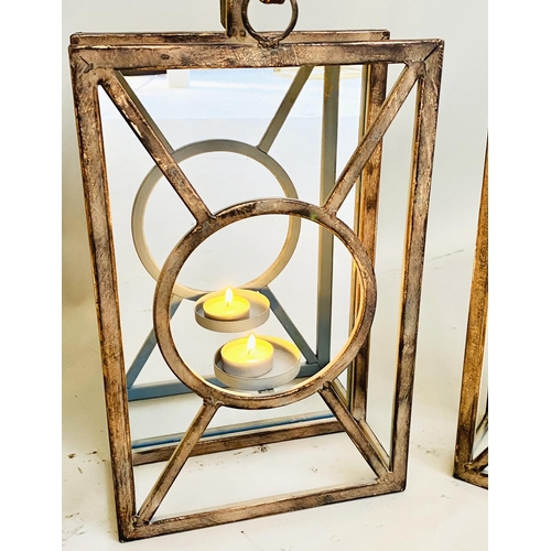 379 - WALL HANGING CANDLE LANTERNS, a set of six, Art Deco style, mirrored backs, 43cm x 22cm x 11cm. (6)