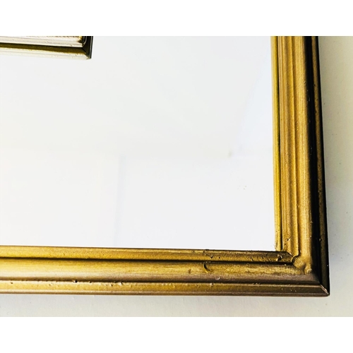 386 - WALL MIRROR, 180cm high, 63cm wide, Regency style, arched design, gilt metal frame.