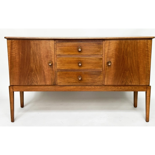 426 - GORDON RUSSELL SIDEBOARD, 1970s walnut with three drawers flanked by panelled doors stamped 'Russell... 