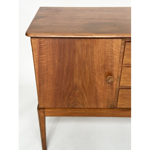 426 - GORDON RUSSELL SIDEBOARD, 1970s walnut with three drawers flanked by panelled doors stamped 'Russell... 