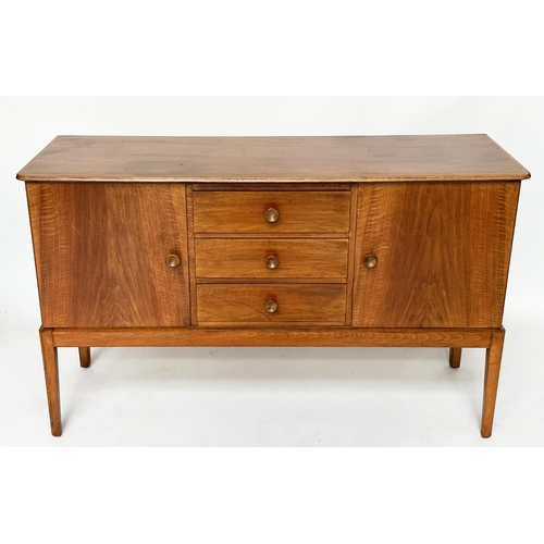 426 - GORDON RUSSELL SIDEBOARD, 1970s walnut with three drawers flanked by panelled doors stamped 'Russell... 