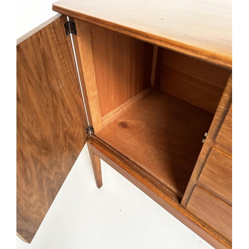 426 - GORDON RUSSELL SIDEBOARD, 1970s walnut with three drawers flanked by panelled doors stamped 'Russell... 