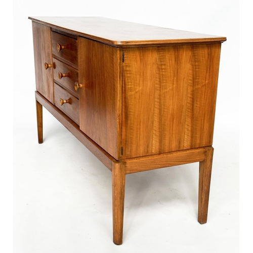 426 - GORDON RUSSELL SIDEBOARD, 1970s walnut with three drawers flanked by panelled doors stamped 'Russell... 