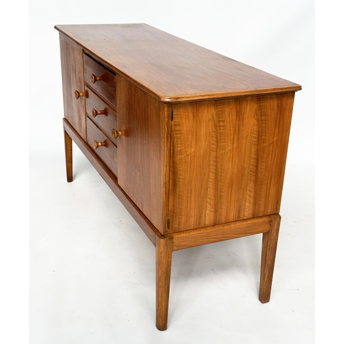 426 - GORDON RUSSELL SIDEBOARD, 1970s walnut with three drawers flanked by panelled doors stamped 'Russell... 