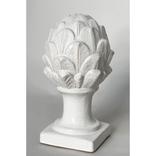 431 - ARTICHOKES, a pair, white ceramic on columns and plinths, 30cm H. (2)