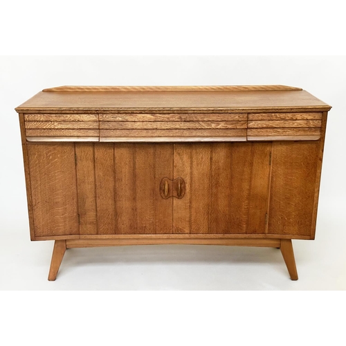 439 - EVEREST SIDEBOARD, mid 20th century oak with three doors above two slatted doors on splay supports, ... 