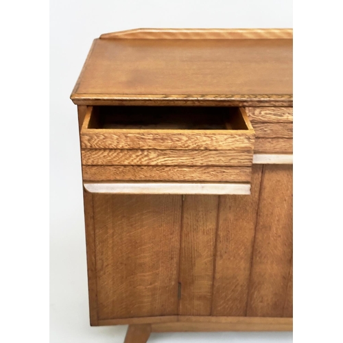 439 - EVEREST SIDEBOARD, mid 20th century oak with three doors above two slatted doors on splay supports, ... 