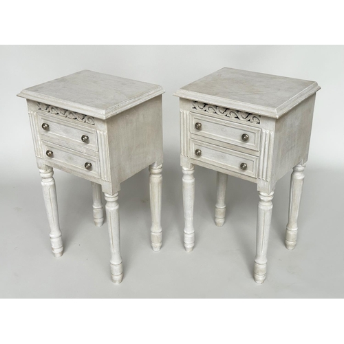 452 - BEDSIDE CHESTS, a pair, French traditionally grey painted each with two drawers and pierced frieze, ... 