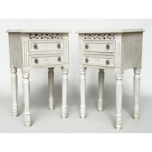 452 - BEDSIDE CHESTS, a pair, French traditionally grey painted each with two drawers and pierced frieze, ... 