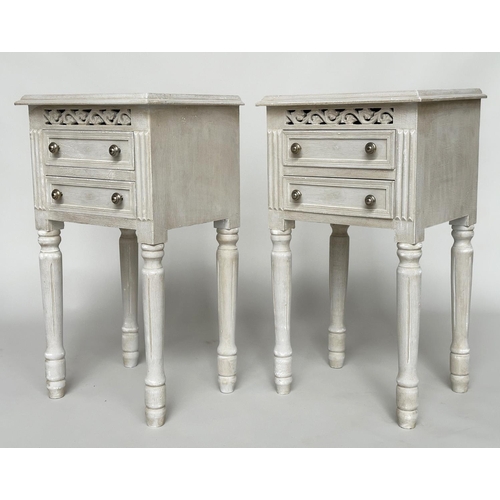 452 - BEDSIDE CHESTS, a pair, French traditionally grey painted each with two drawers and pierced frieze, ... 