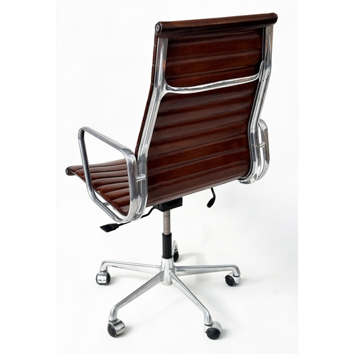 459 - AFTER CHARLES AND RAY EAMES ALUMINIUM GROUP STYLE CHAIR, with ribbed mid brown leather high back sea... 