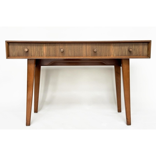 462 - HEALS WRITING TABLE, 1970's teak, concave fronted with three frieze drawers and splay supports attri... 