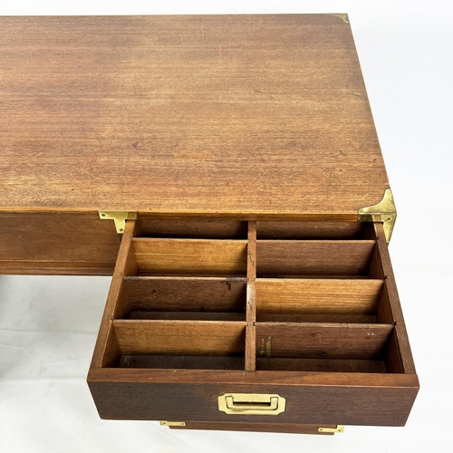 485 - CAMPAIGN STYLE PEDESTAL DESK, teak and brass bound, with an arrangement of seven drawers, 78cm H x 1... 