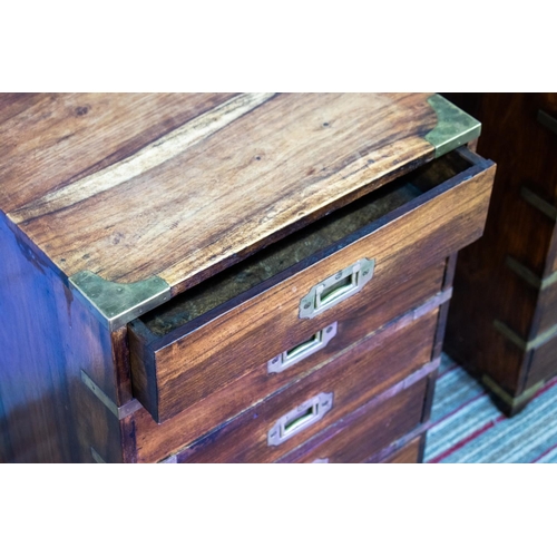 486 - CAMPAIGN STYLE BEDSIDE CHESTS, 53cm H x 38cm W x 38cm D, a pair, hardwood and brass bound of five dr... 