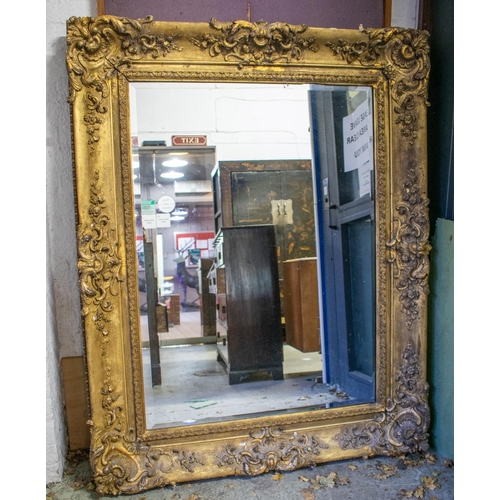 487 - WALL MIRROR, 150cm x 118cm, 19th century giltwood and gesso with later rectangular plate.