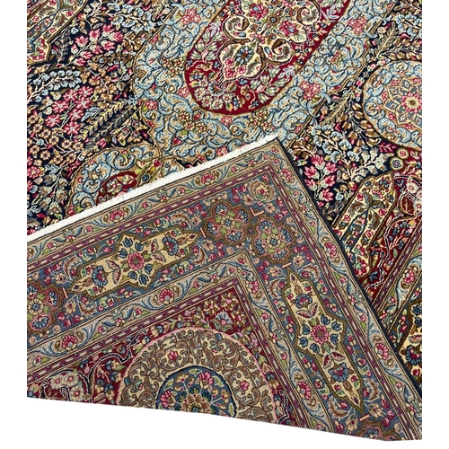 87 - FINE PERSIAN LAVER KERMAN CARPET, 320cm x 197cm.