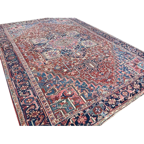 94 - ANTIQUE PERSIAN HERIZ CARPET, 345cm x 245cm.