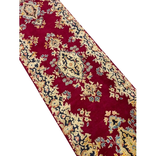 99 - FINE PERSIAN KIRMAN RUNNER, 288cm x 75cm.