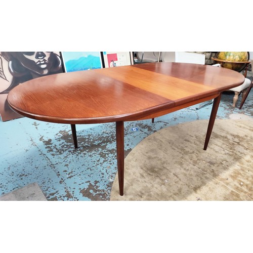 357 - G PLAN EXTENDING DINING TABLE, 1970s, teak, the top sliding out reveal extra leaf, raised on turned ... 