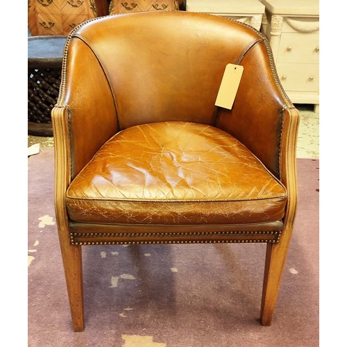 139 - A BERGERE CHAIR, mid 20th century, brown leather upholstered mahogany arms and legs, 82cm H x 62cm 