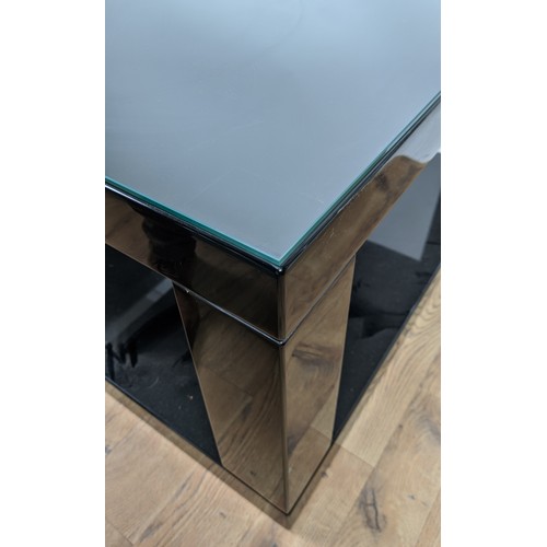 306 - LOW TABLES, a pair, black lacquered with glass tops, 85cm x 65cm x 51cm. (2)