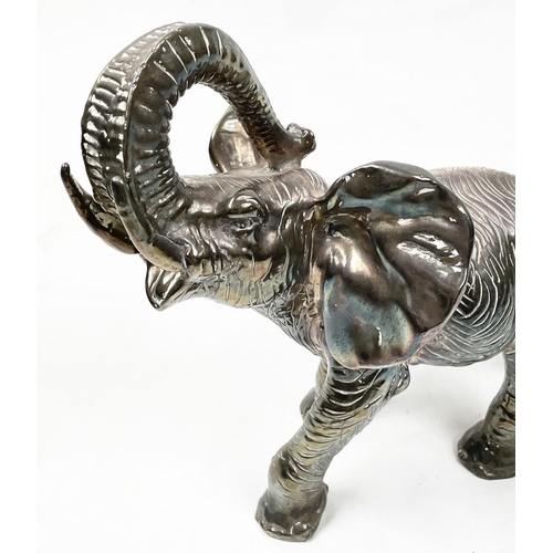 21 - SILVER CLAD ELEPHANT, marked 925, 28cm L x 25cm H.