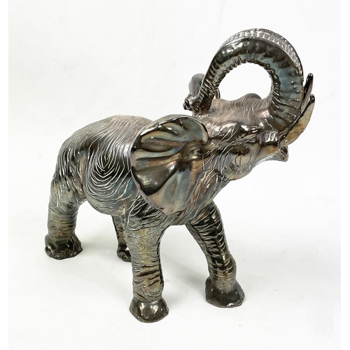 21 - SILVER CLAD ELEPHANT, marked 925, 28cm L x 25cm H.