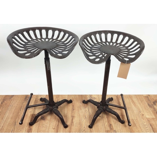 498 - STOOLS, a set of eight tractor seat style, height adjustable, 81cm H at tallest approx, with adjusta... 